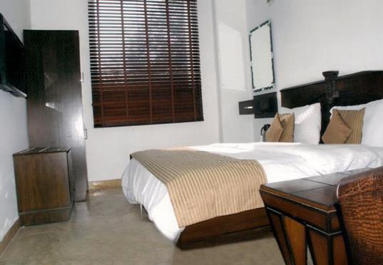 Hotel Sehej Inn Nueva Delhi Habitación foto